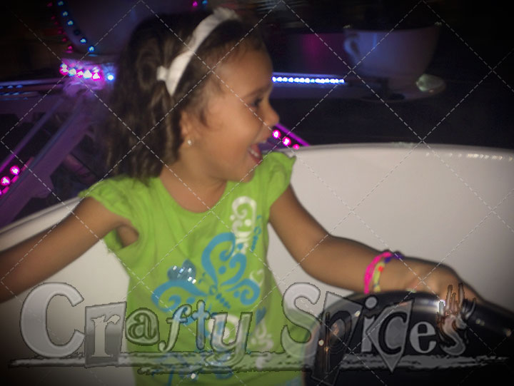 Kira having fun on the tea cups Kira having fun on the tea cups