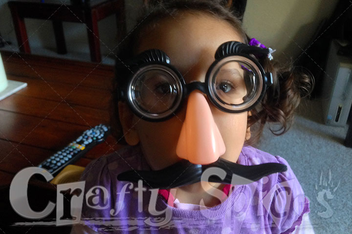 Kaylee with the silly face and her fancy Mustashe