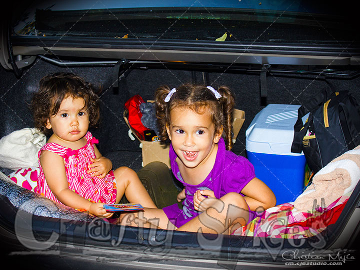 Kira and Kaylee having fun in the trunk of our car Kira and Kaylee having fun in the trunk of our car