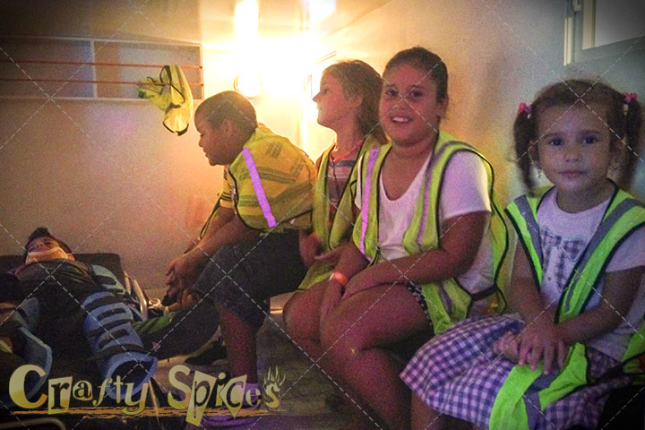 Children inside a small Ambulance.