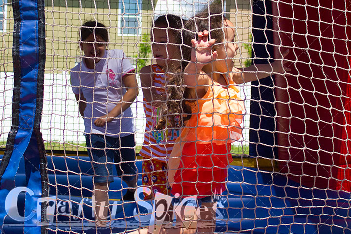 All girls in a bouncy house 