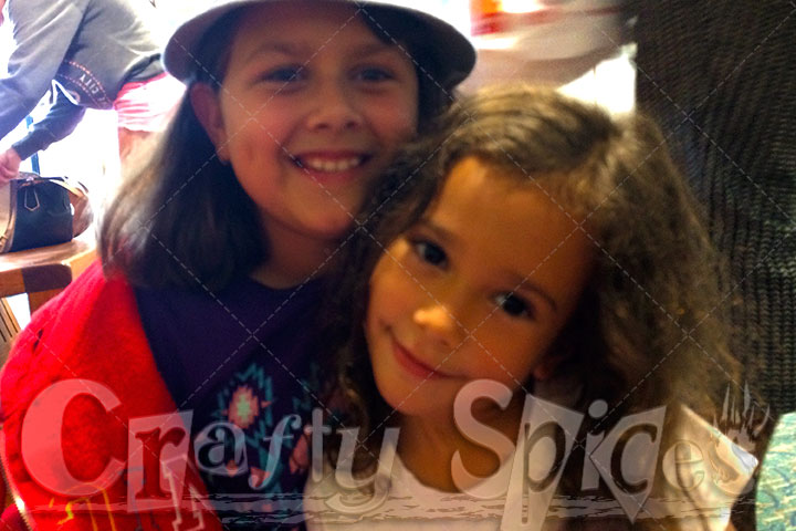 Kaylee's Baptism Big Hug with cousin N